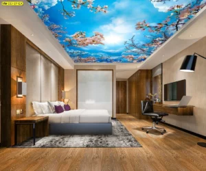 วอลเปเปอร์ภาพวิวท้องฟ้า และดอกซากุระบนเพดานห้องพักโรงแรมหรูสไตล์โมเดิร์นพร้อมโต๊ะทำงานและเตียงคิงไซส์