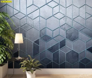 วอลเปเปอร์ลายกราฟิกหกเหลี่ยม สไตล์โมเดิร์นโทนสีน้ำเงิน-เทา ติดตั้งบนผนังห้องรับรองลูกค้า สร้างบรรยากาศที่สงบและเป็นมืออาชีพ