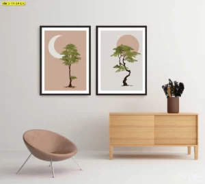 คู่กรอบรูปต้นไม้สไตล์มินิมอลฉากพระจันทร์และดวงอาทิตย์โทนอบอุ่น ติดผนังเหนือคอนโซลไม้ในมุมรับรอง เรียบหรูคุมโทนเข้ากับอินทีเรียร์ร่วมสมัยของอพาร์ตเมนต์เมือง