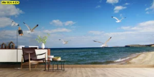 ภาพวิวชายหาดและท้องฟ้าพร้อมนกนางนวลบิน เหมาะสำหรับตกแต่งมุมอ่านหนังสือ เติมความเคลื่อนไหวและความลึกให้ผนัง เข้าคู่พื้นไม้และของตกแต่งโทนเอิร์ธ