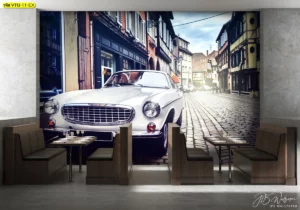 วอลเปเปอร์ภาพรถคลาสสิก สีขาวบนถนนหินยุโรป สำหรับตกแต่งคาเฟ่สไตล์ยุโรเปียนคลาสสิก