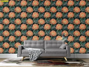 ผนังห้องนั่งเล่นลายดอกไม้ส้มเขียวซ้ำลายบนพื้นดำ คู่โซฟาเทาและโคมไฟตั้งพื้น โทนภาพชัดตัดกันให้เด่น