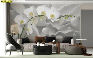 วอลเปเปอร์ดอกกล้วยไม้สีขาวบนฉากพื้นเรขาคณิตโทนเทาแต่งผนังหลังโซฟาในห้องรับแขกสไตล์โมเดิร์น ทำให้ห้องดูกว้างหรูและสว่าง เหมาะกับบ้านและคอนโดที่ต้องการผนังจุดเด่นเรียบสะอาดตา​