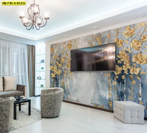 วอลเปเปอร์ดอกไม้ทองบนฉากพื้นน้ำเงินเทาแต่งผนังหลังทีวีในห้องนั่งเล่น ช่วยยกระดับบรรยากาศให้หรูคล้ายห้องรับแขกโรงแรม เหมาะกับเจ้าของบ้านที่ต้องการผนังโฟกัสโทนทองหรูร่วมสมัย​