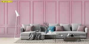 ไอเดียตกแต่งผนังห้องนั่งเล่นโทนสีชมพูหวานด้วยวอลเปเปอร์กรุผนังลายเรียบคลาสสิก ให้ความรู้สึกละมุน อบอุ่น และทันสมัยในเวลาเดียวกัน