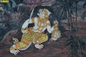 รูปภาพติดผนังห้องพระลายไทยสีทองประณีตแสดงภาพหนุมานถือศีรษะยักษ์เป็นงานศิลปะชั้นครูที่ทรงคุณค่าและดูเข้มขลัง